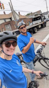 Amy and Walt on bicycles canvassing Ward 14. Bike the Vote! 